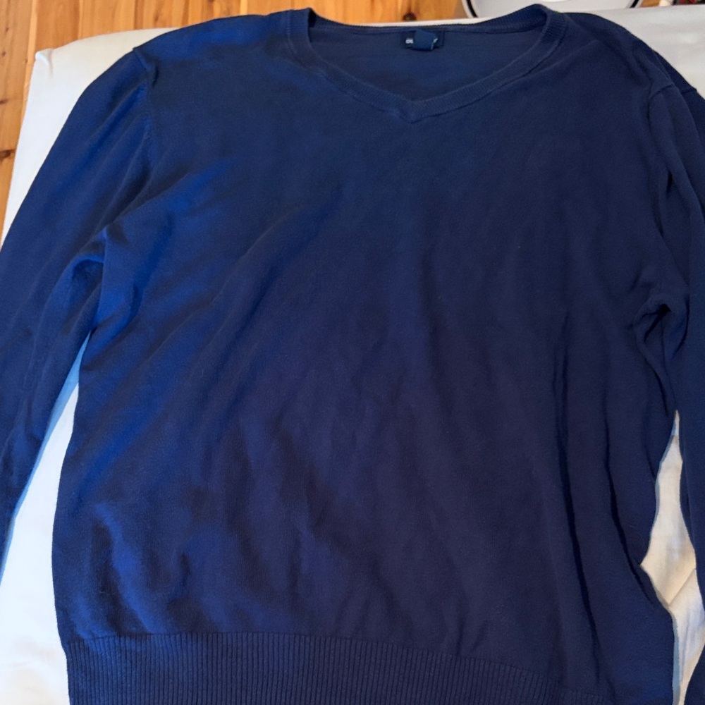 Woman’s Blue V-Neck Sweater